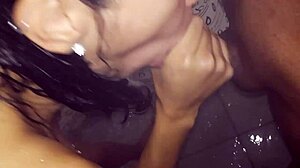A Latina amateur chokes on a big cock while showering