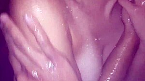 A Latina amateur chokes on a big cock while showering
